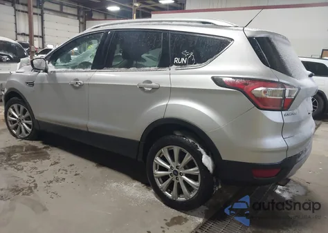 2017 Ford Escape Titanium z USA, uszkodzony, nr VIN 1FMCU9J99HUB30801